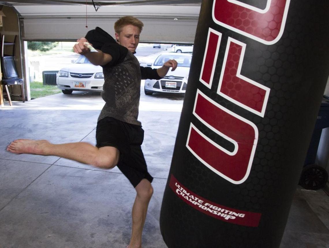 With plans to be a professional fighter, Talon Owens worked out in his garage practicing a Thai fighting technique, Muay Thay, taught to him by his father. Owens said the workout was a good way to blow off steam.