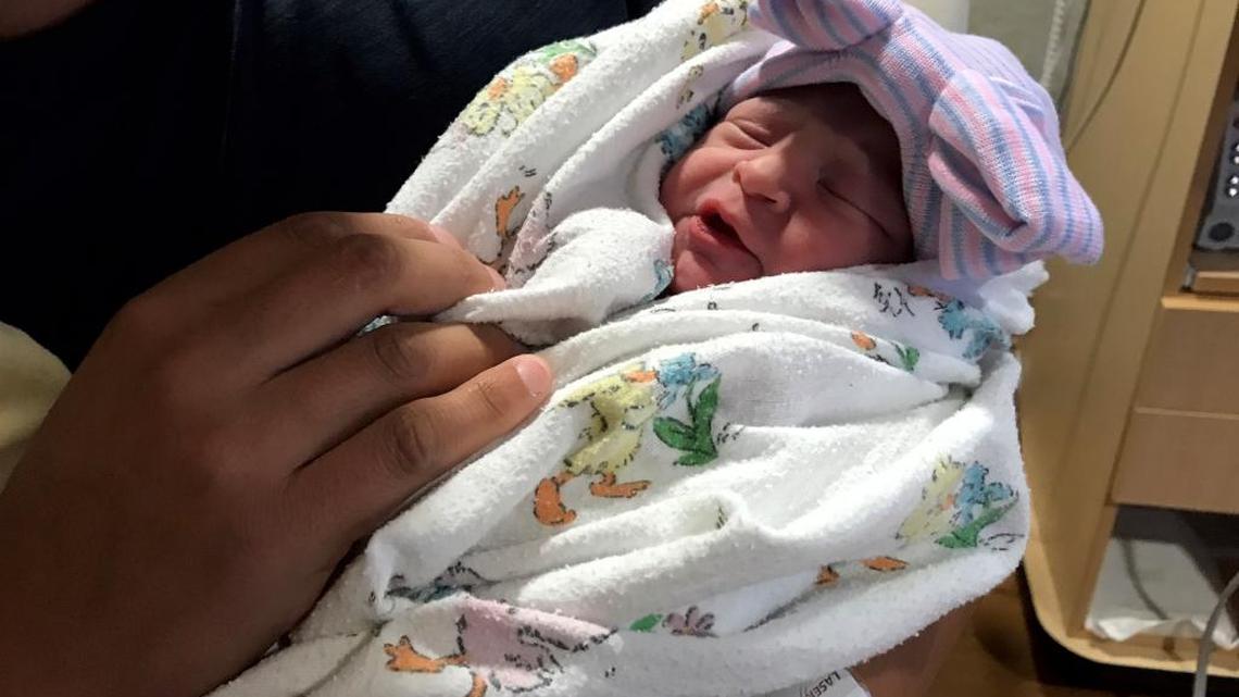 Ali Gonzalez was born at West Valley Medical Center in Caldwell one minute before the solar eclipse began Monday. She was born with a "caul," or amniotic sac still covering her head, a rare occurrence.