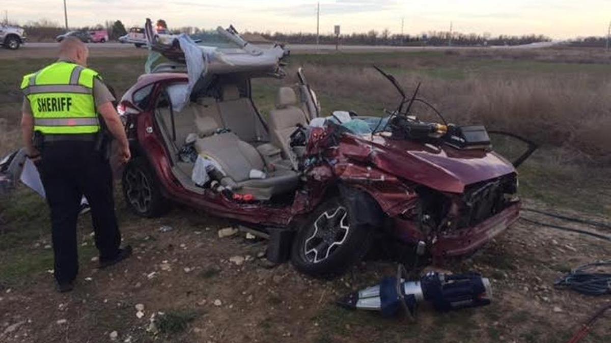 Firefighters peeled back the top of this Subaru to free three injured people after a two-car crash at the intersection of Idaho highways 44 and 16 Tuesday evening.