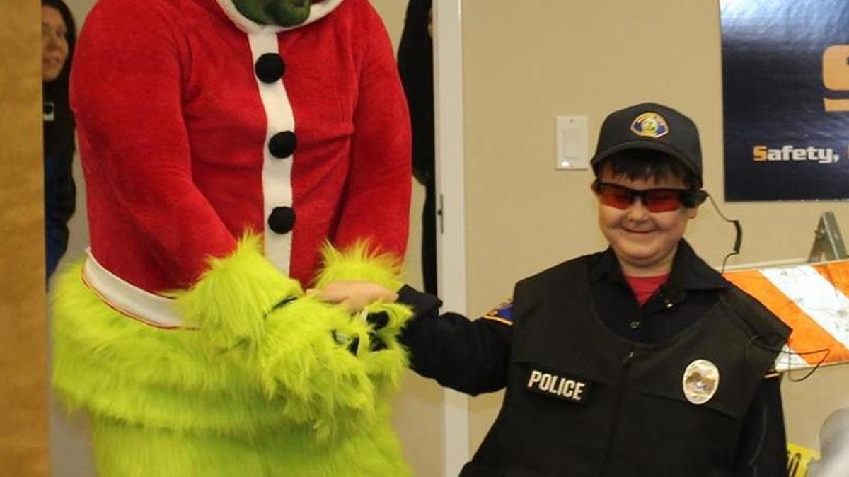 Beckham Hoagland beams after apprehending the Grinch.