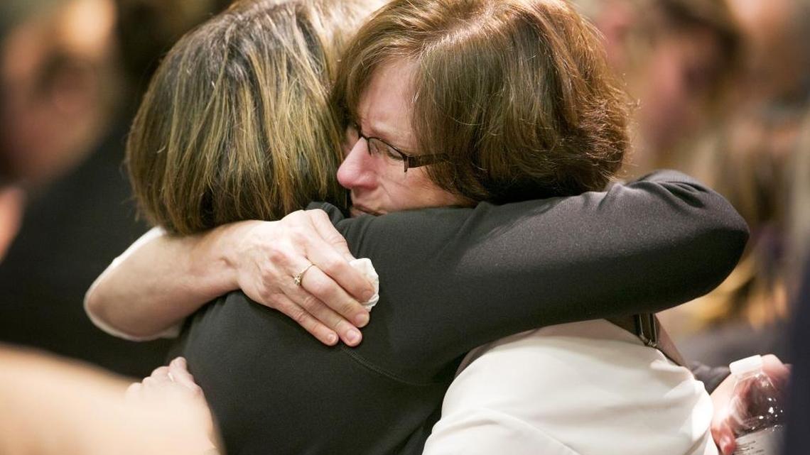 Mary Helen Green, right, gets a hug after a remembrance for her daughter Sierra Bush was held in the Jordan Ballroom at Boise State University Wednesday evening. Sierra Bush was found dead near Idaho City on Saturday.