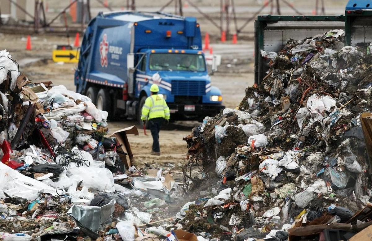 A Republic Services trash truck prepares to unload 25 cubic yards (about 100 homes’ worth) of trash at the Ada County Landfill. That trash can create methane, which can then be purified into natural gas.