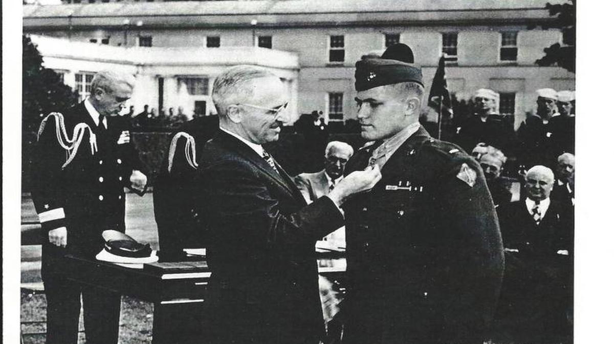 President Harry S. Truman pins the Medal of Honor on Art Jackson during an Oct. 5, 1945, ceremony on the lawn outside the White House. 
