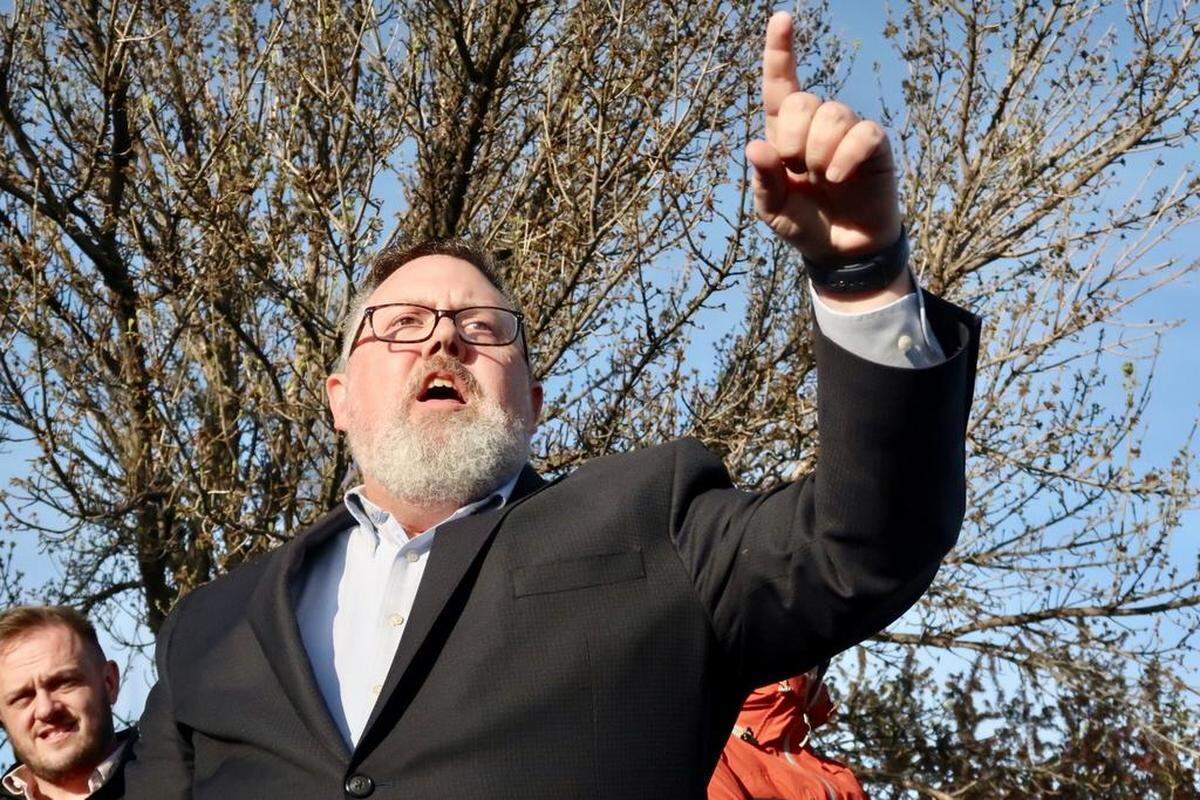 Boise lawyer Geoffrey Wardle, representing Atlanta developer Greenstone Properties, addresses a tense crowd in April 2018 over Greenstone’s proposed stadium at Americana Boulevard and Shoreline Drive, on the southern edge of Downtown Boise. A few months later, Greenstone traded that site for a different one a half mile northwest.