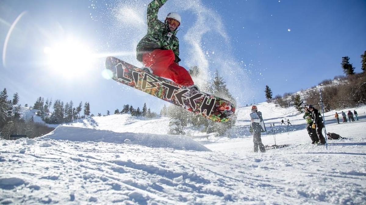 In this photo from January of 2017, a snowboarder hits a trick while talking part in the freestyle heat during a ski racing competition held at Bogus Basin Mountain Recreation Area.