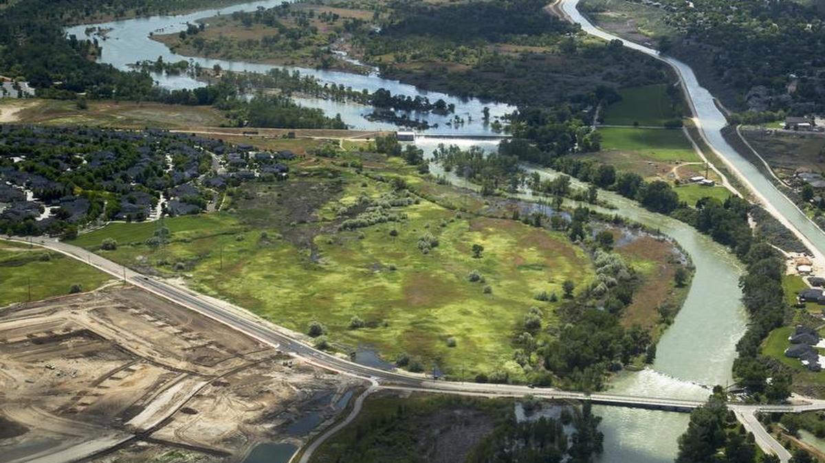 The Boise River runs above flood stage through East Boise on May 26 with an aerial view with EcoFlight pilot Bruce Gordon.