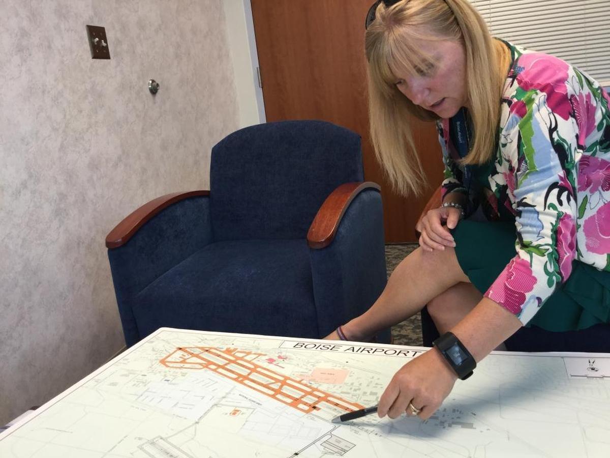 Boise Aiport Director Rebecca Hupp talks about a taxiway that was built to connect an aircraft maintenance hangar to the rest of the airport during a project a decade ago.