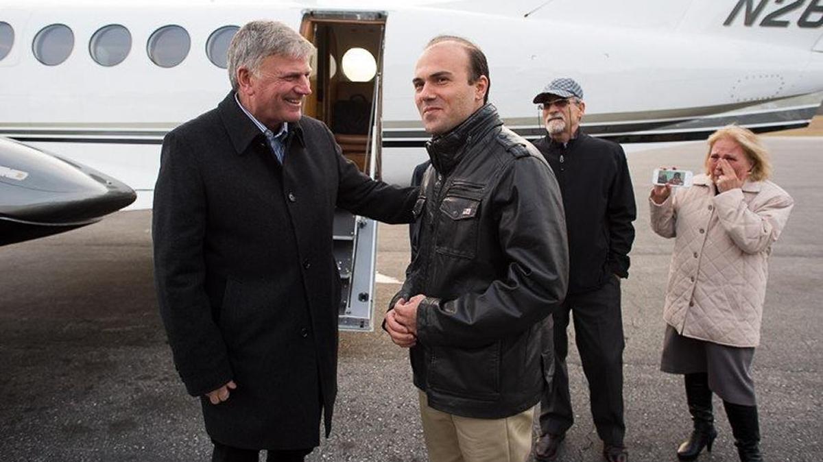 Saeed Abedini with the Rev. Franklin Graham shortly after Abedini arrived in Charlotte, N.C., in January 2016. His parents look on.