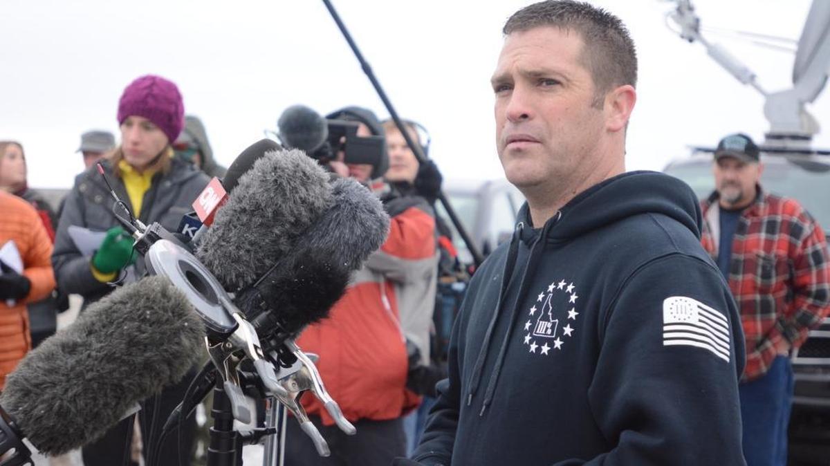 Brandon Curtiss speaks to reporters at the Malheur Wildlife Refuge after he and other armed members of the Pacific Patriot Network from Idaho, Washington and Oregon arrived at the wildlife refuge outside Burns, Ore., on Jan. 9.
