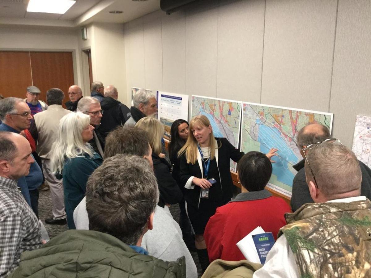 Boise Airport Director Rebecca Hupp explains maps projecting noise impacts from the Boise Airport during an open house at the airport several years ago.