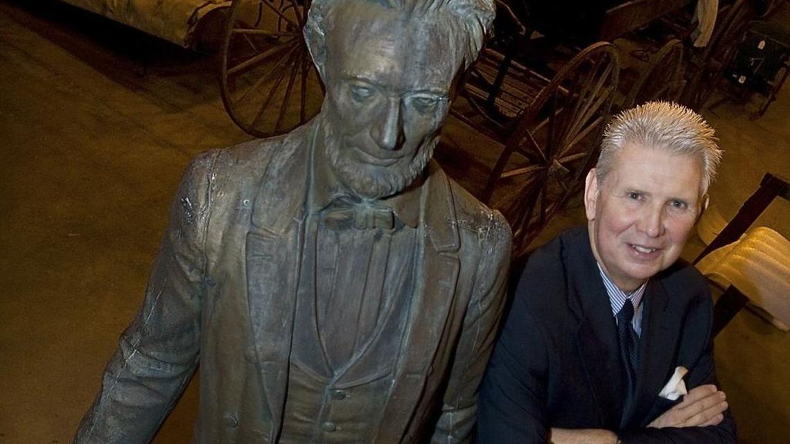 David Leroy, then chairman of the Idaho Abraham Lincoln Bicentennial Commission, stands in 2009 next to the life-sized statue of Abraham Lincoln in the Idaho State Historical Society Artifact Storage Center.