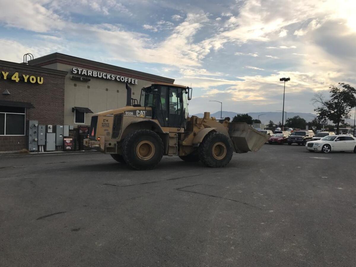 Cars have been mingling with construction equipment in the parking lot of the Albertsons complext at Cole / Fairview since the beginning of the year.