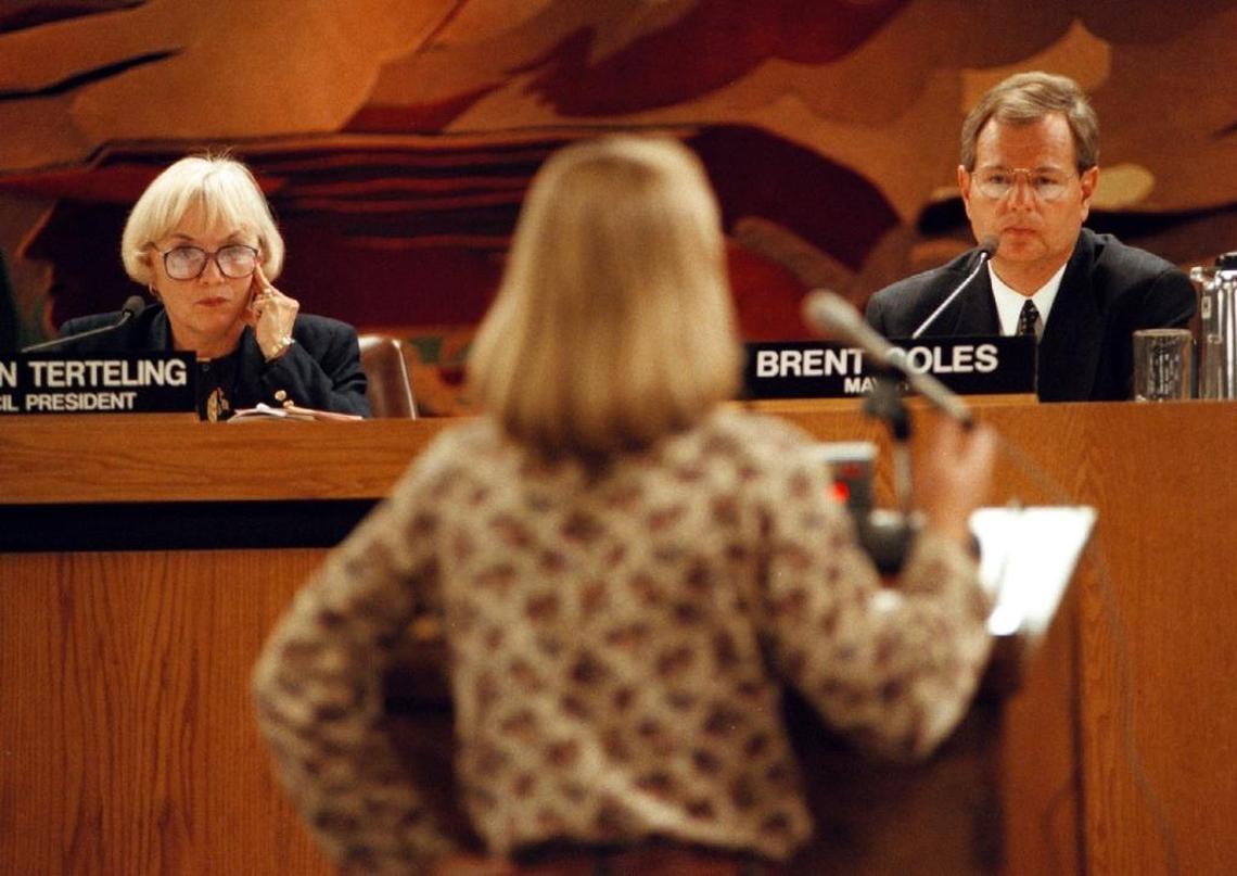 Boise City Council President Carolyn Terteling and Mayor Brent Coles listen to a woman during an Oct. 1, 1997 council meeting.