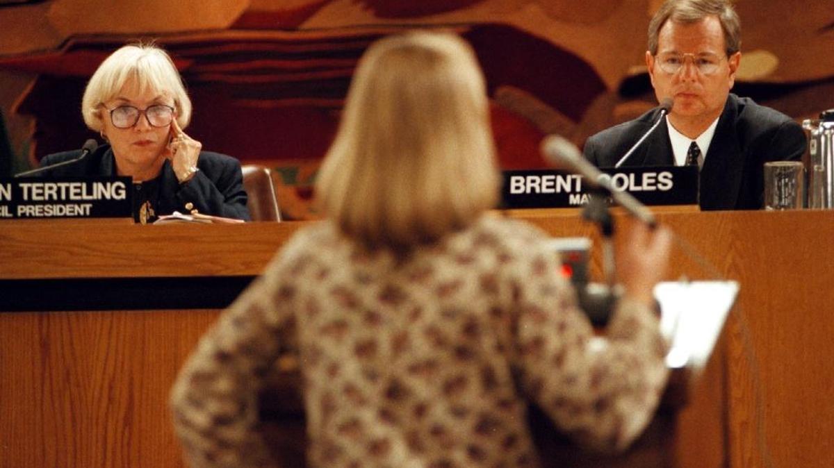 Boise City Council President Carolyn Terteling and Mayor Brent Coles listen to a woman during an Oct. 1, 1997 council meeting.