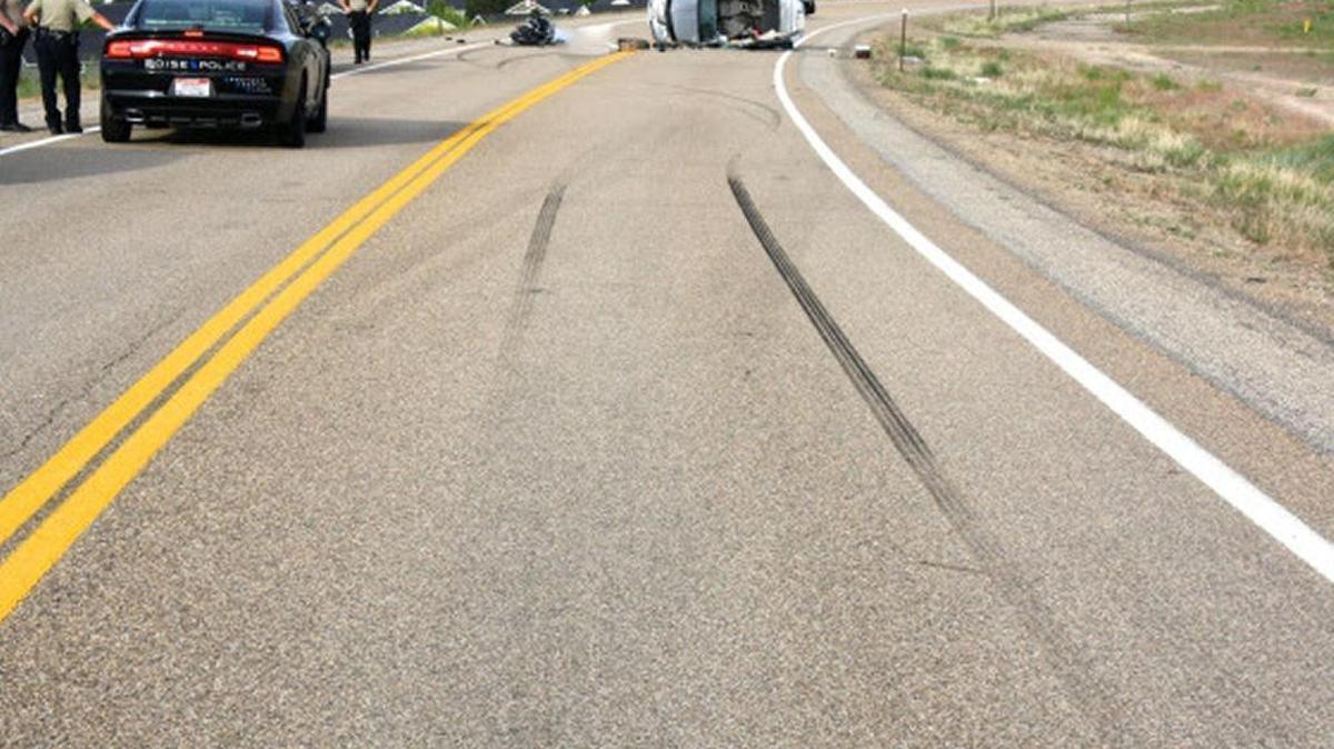 A motorcyclist died, and two people in a car were injured in this crash Friday evening. A third vehicle was reportedly involved but left the scene, and investigators would like to talk to that driver.