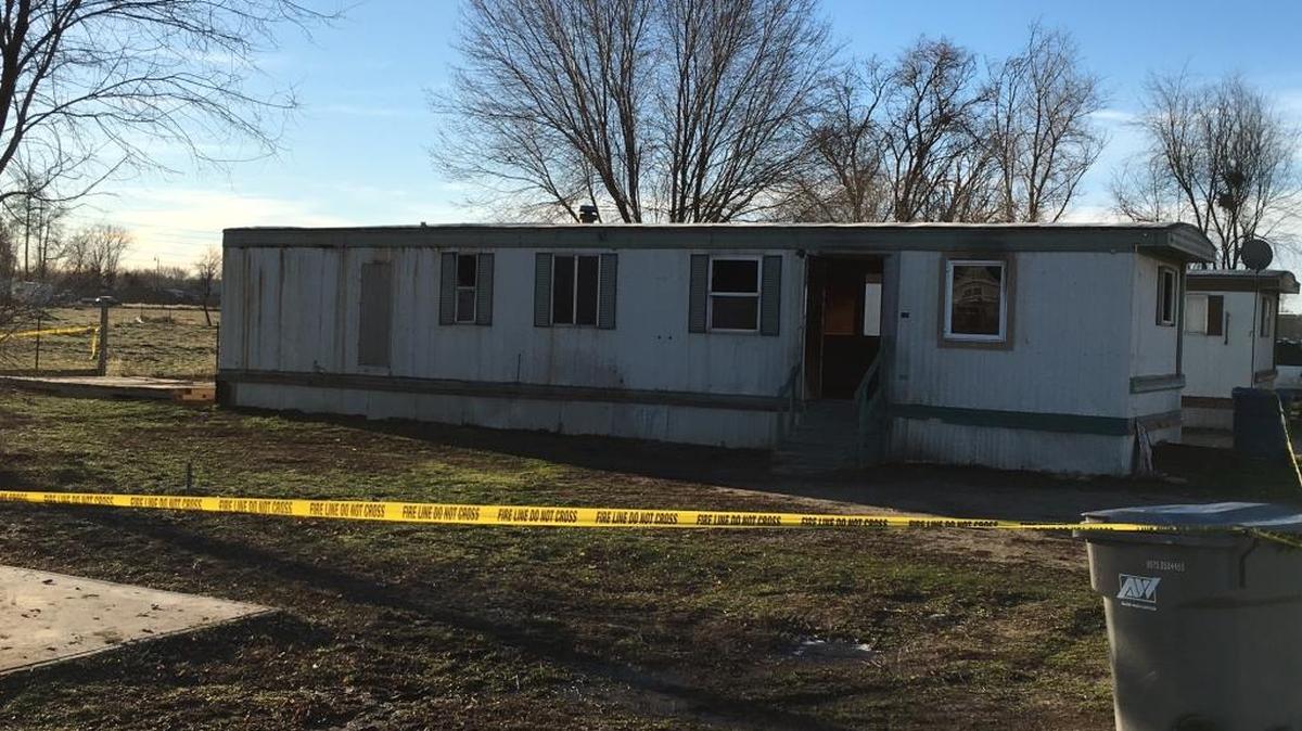 The damaged trailer home Monday morning, Feb. 29.