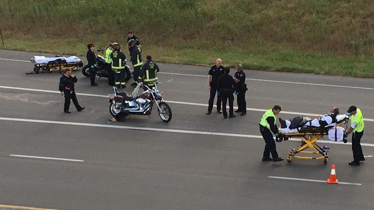 At least one person was transported to the hospital following a motorcycle crash on Broadway Avenue Saturday.