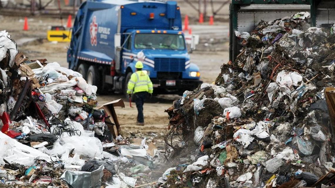 A Republic Services garbage truck prepares to unload 25 cubic yards (about 100 homes’ worth) of trash at the Ada County Landfill last April. An averageAda County resident generates almost 5 pounds of trash per day. A waste-stream analysis found recycling or composting could divert more than 50 percent of this trash from the landfill.