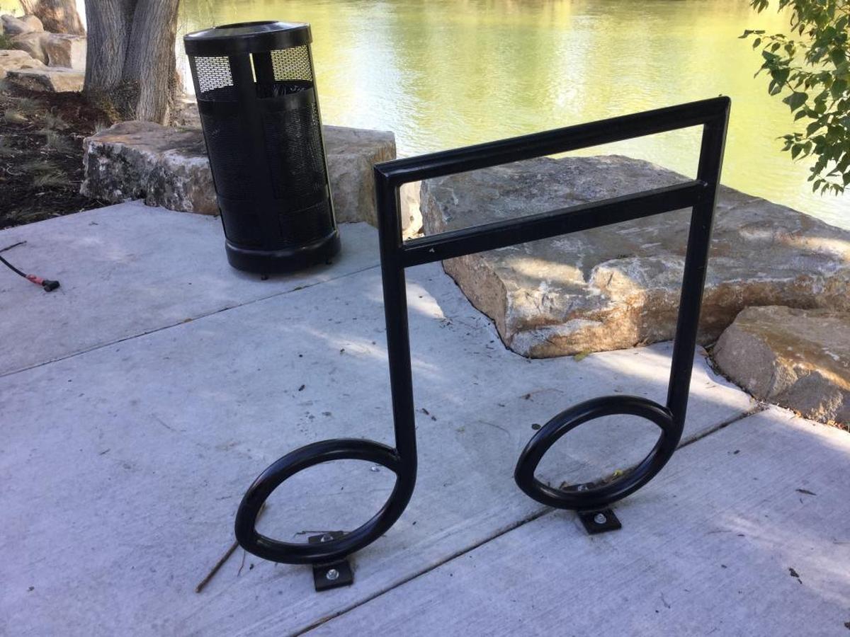 The Riverside Hotel installed musical note bicycle racks and paddle board racks along the Greenbelt behind the hotel.