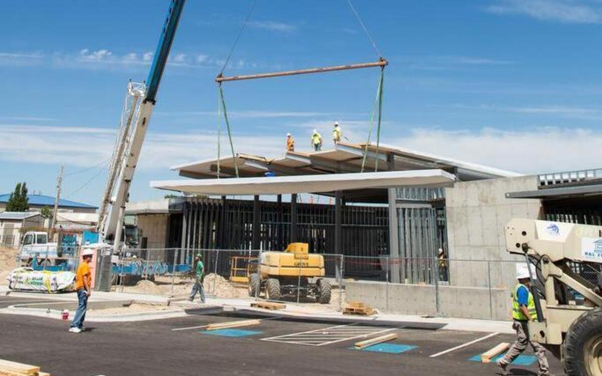 Workers prepare the roof of Boise’s new Bown Crossing library branch Aug. 10.