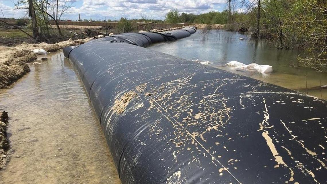 This 600-foot flood diversion tube was installed Friday to keep the water from the Boise River in the river and away from neighborhoods in Eagle and Garden City.