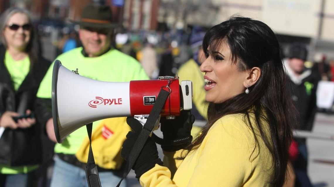 Naghmeh Abedini speaks during a rally before President Barack Obama's speech at Boise State University on Jan. 21, 2015.