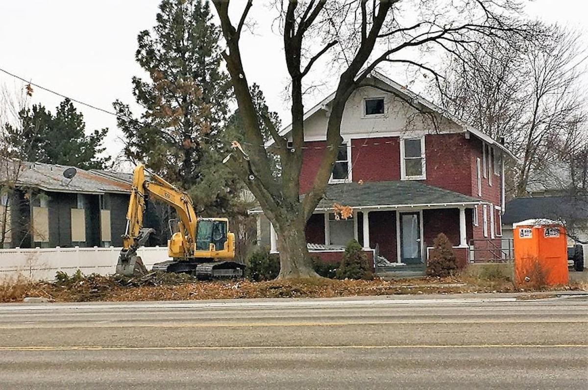 This red farmhouse on State Street started life as the center of a Treasure Valley homestead and later housed various retailers before it became an impediment to street-widening.