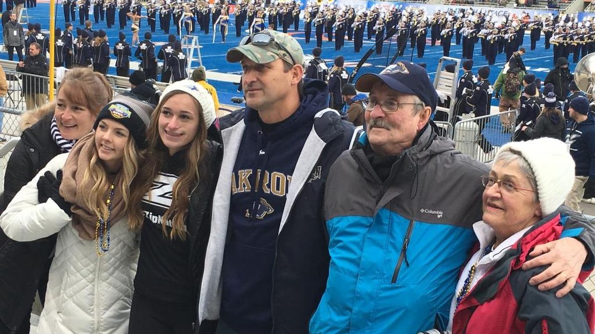 Len Bast, second from right, and his wife Grace, right, traveled from Pennsylvania to Idaho to see their grandson play in the Famous Idaho Potato Bowl. His family snapped some photos at halftime. From left: Jean Evans, Jill Swanson, Dana Evans, Darrin Evans.