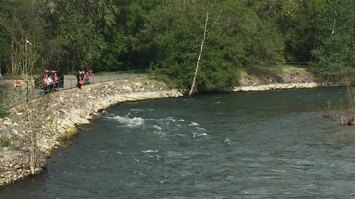 Rescue crews scan the Boise River Thursday evening looking for a man reported floating in the river. The man was located a short time later.