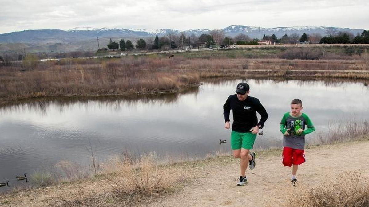 Jason and Luke Hill run at the Hyatt Hidden Lakes Reserve in Boise in March 2017. An open space preservation levy Boise voters passed in 2015 hasn’t been collected due to a paperwork error, and the city is scheduling a new vote on it.