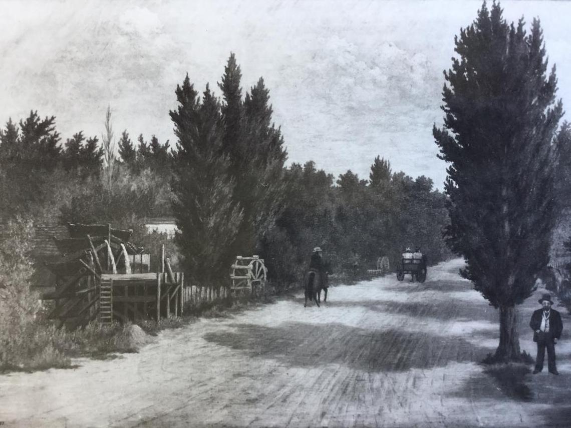 An 1897 painting by T. Slight shows Boise’s Grove Street and its water wheels.