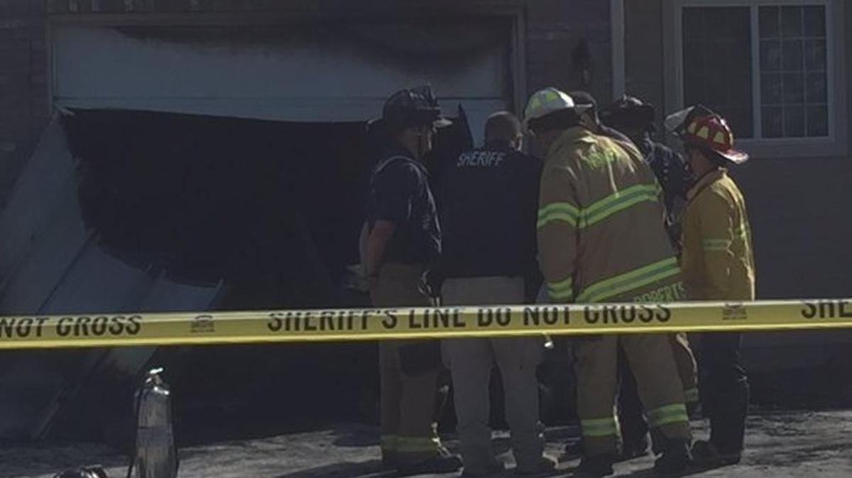 Nampa firefighters investigate a fire in a garage on Rocklan Court Thursday afternoon.