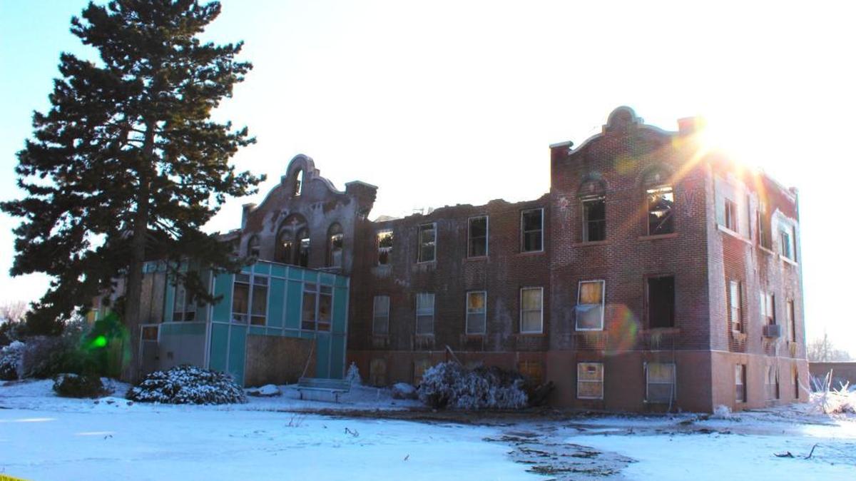 Nampa's abandoned Mercy Hospital was hollowed out by fire overnight Saturday.