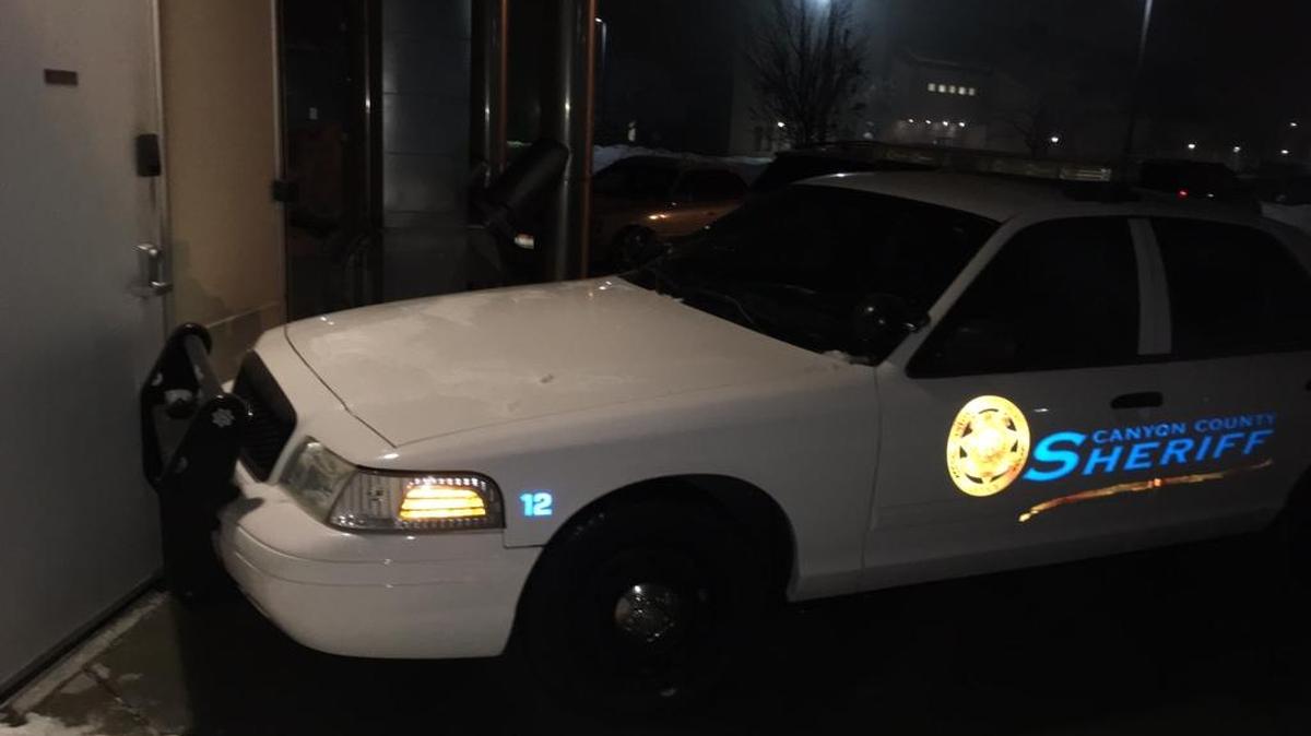 A patrol car blocks an external kitchen door to the Canyon County jail’s tent facility in December 2016 after an escape.