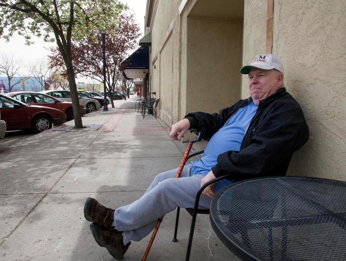 Mike Himebauch, a resident at Van Engelen Apartments in downtown Nampa, enjoys the spring weather Thursday. Himebauch said he has lived at the apartments for 10 years. New Mayor Debbie Kling says getting more people to live downtown would help revive it.