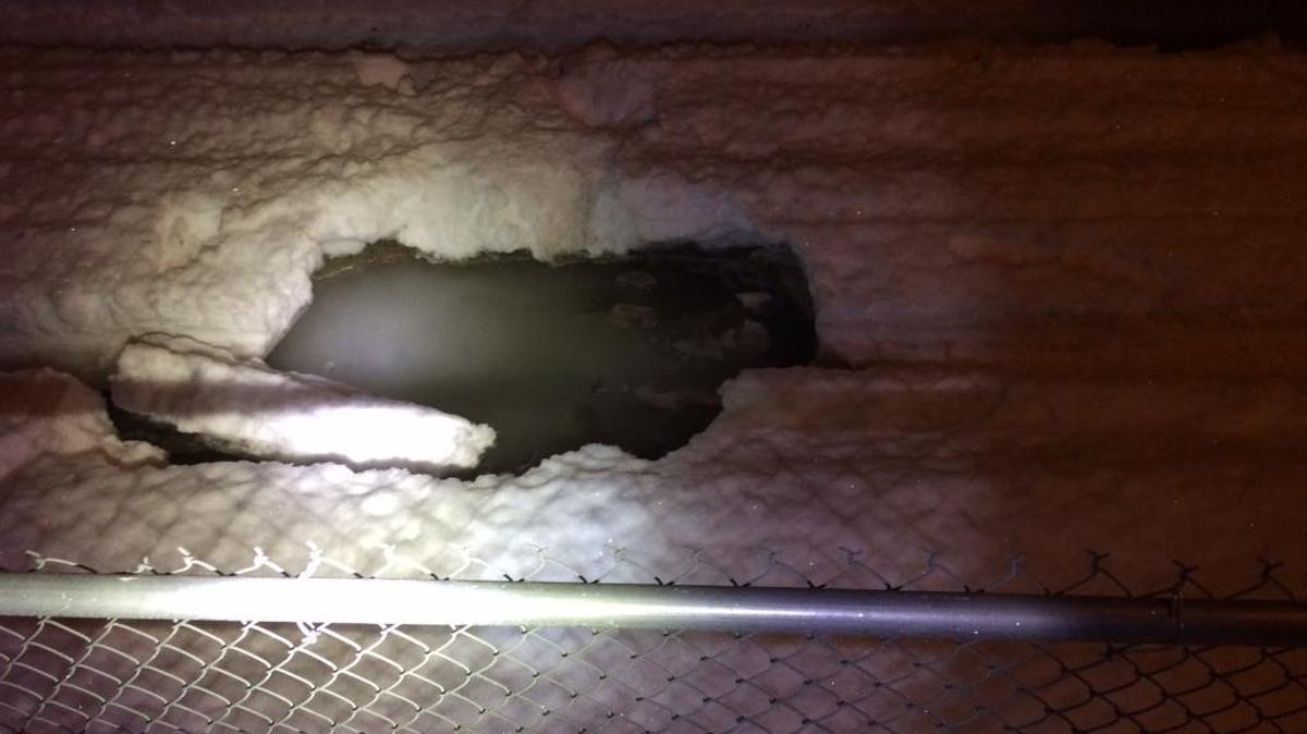 A Nampa police officer fell waist-deep into this sinkhole in an alley near downtown late Monday night, and another officer fell through a separate hole at the same time.