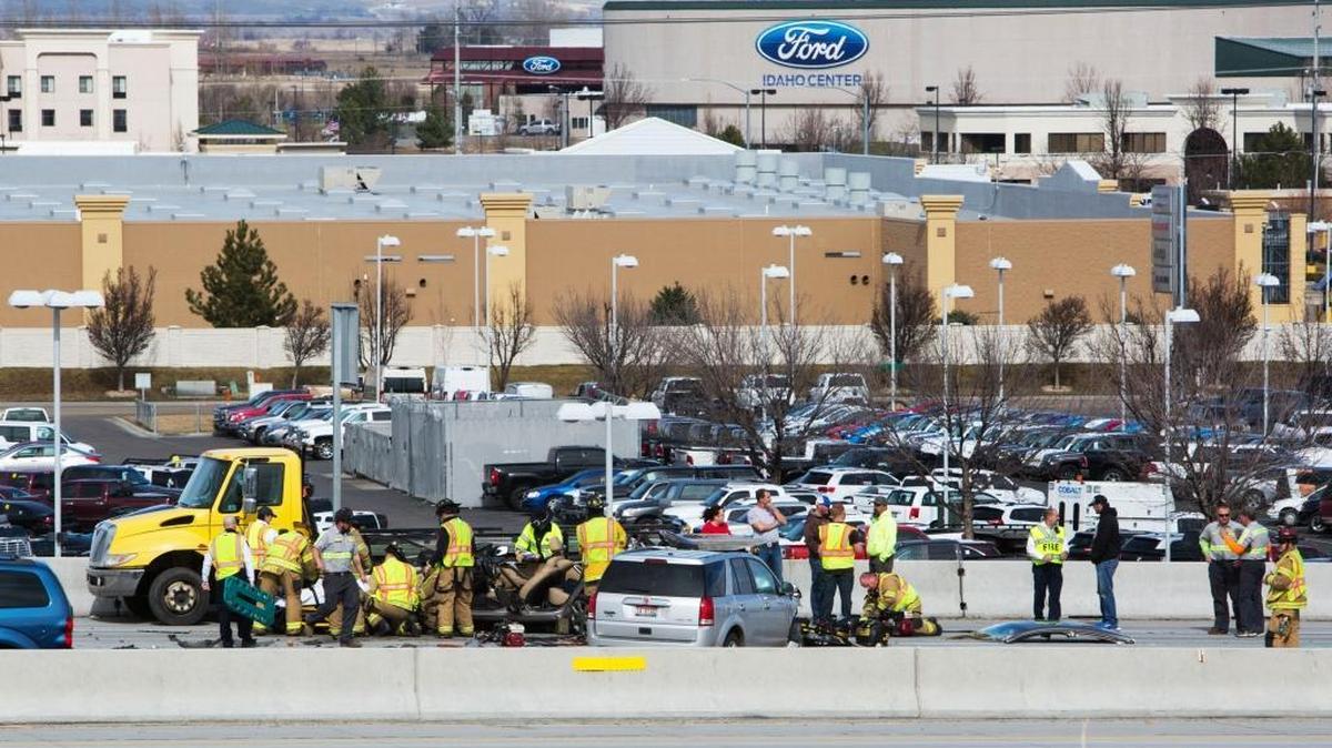 Emergency responders tend to an early afternoon accident Tuesday on westbound Interstate 84 near the Garrity Boulevard exit in Nampa.
