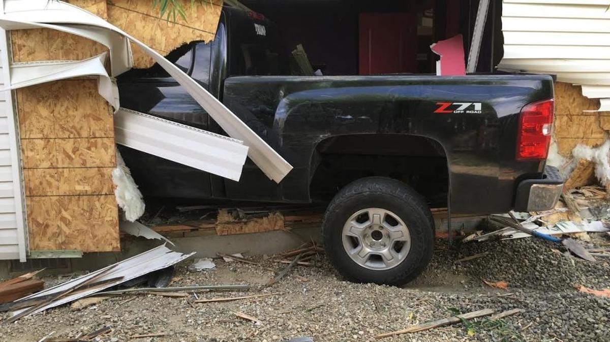 This Chevy truck plowed through the side of a Caldwell home Monday morning, but no one was inside, Caldwell police report. The two people in the truck suffered only minor injuries.