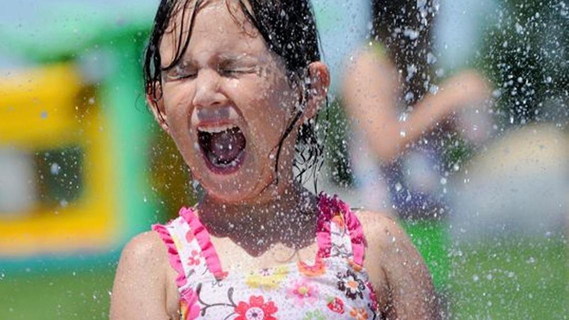 This is the photo that USA Today used to illustrate Meridian as the best city to live in the United States: an Associated Press photo of Kayla Holdridge getting sprayed with water at Settlers Park.