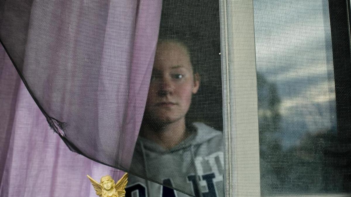 Isabell Hoffman stands near her bedroom window at her family's house in Caldwell. Earlier this month Hoffman, 16, woke up about 3 a.m. to Ricky E. Herrera, 26, falling on her bed after breaking into her bedroom window. She chased him off. "I didn't get much sleep after that. My adrenaline was pretty high," Hoffman added.