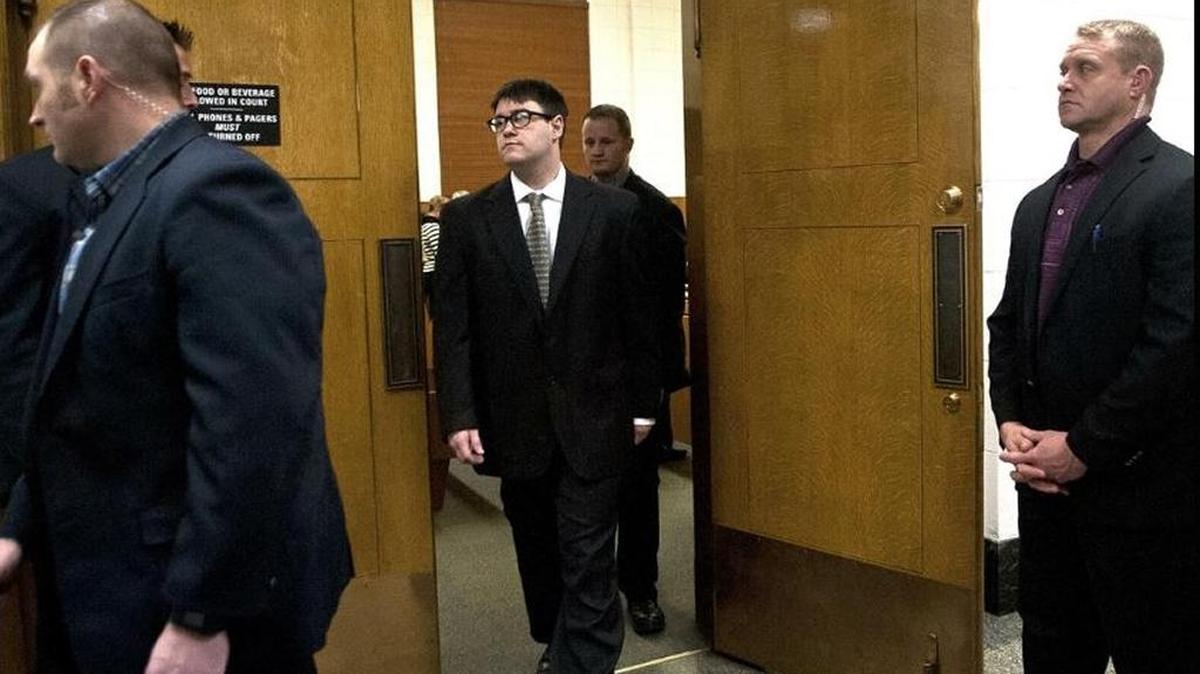 Jonathan Renfro walks out of the courtroom at the Kootenai County Courthouse in Coeur d'Alene on Friday, Oct. 13, 2017, after a jury found Renfro guilty of first-degree murder for killing of Coeur d’Alene police Sgt. Greg Moore. (Kathy Plonka / The Spokesman-Review)