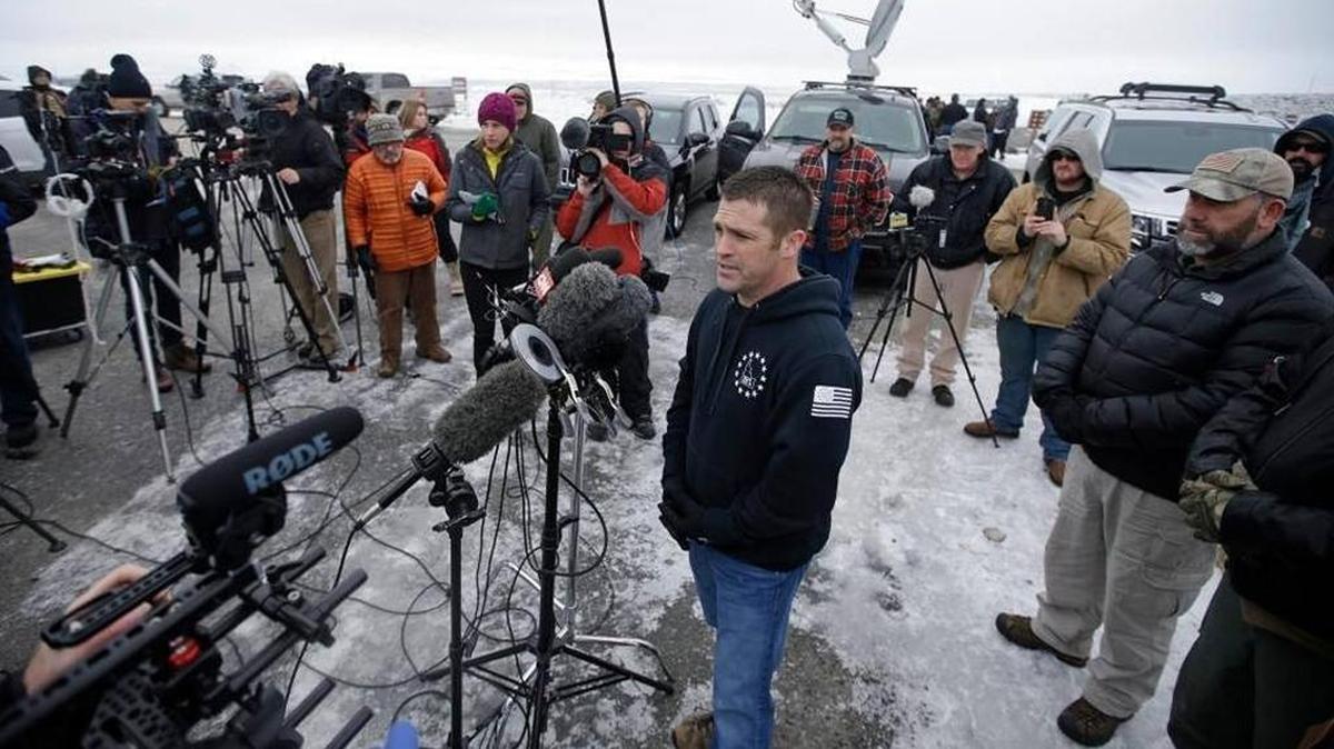 Brandon Curtiss speaks to reporters at the Malheur National Refuge outside Burns, Oregon, in January 2016. Curtiss, then president of 3% of Idaho, joined a group of armed men who set up a security perimeter during a standoff at the refuge.