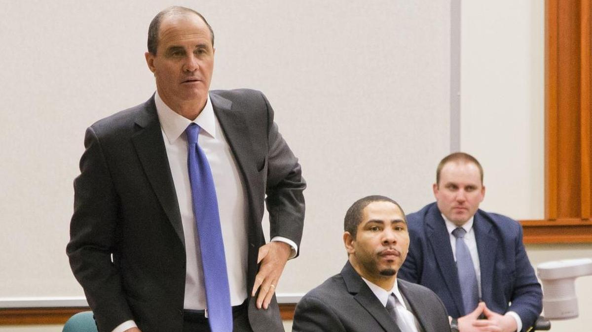 Anthony Robins, Jr., center, appears with attorney Brian McMonagle, left, in the double homicide trial in Ada County District Court. Robins is accused of hiring John C. Douglas to kill Travontae Calloway and Elliott Bailey for allegedly stealing 30 pounds of marijuana that belonged to Robins.