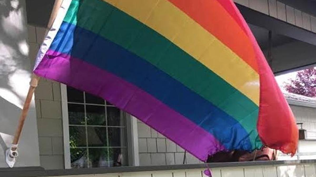 This Pride flag hanging at a North Boise home was burned overnight Saturday, and Boise police are investigating the incident as malicious harassment.