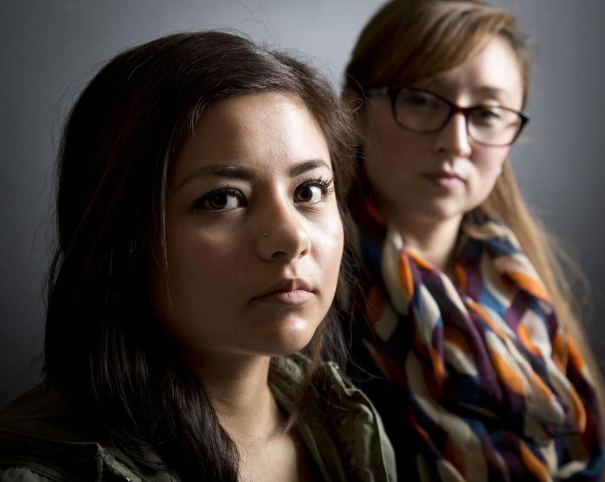 “We’re not going to just be another family with a victim’s story,” said Laura Diaz, right. At left is sister Judy.