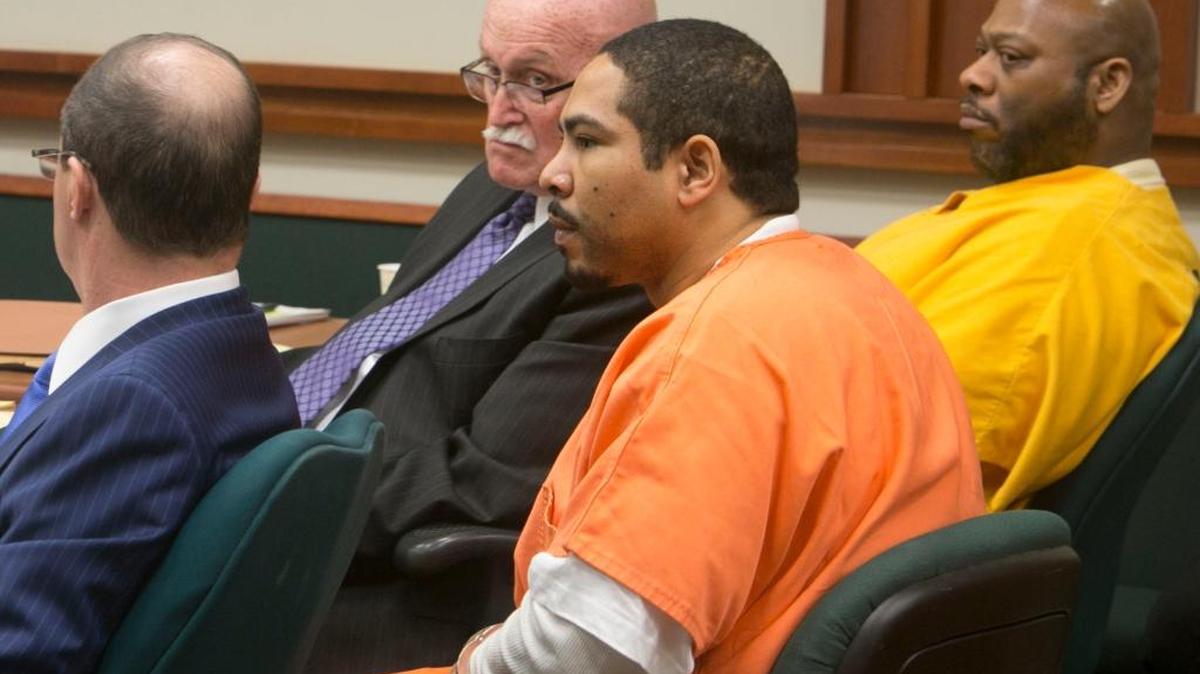 John Douglas (yellow) and Anthony Robins (orange) at a court hearing in March 2015.