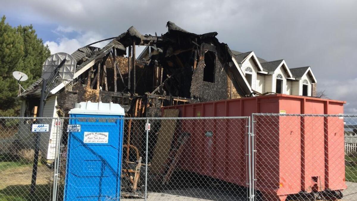 The aftermath of the fire at the Helekers’ home.