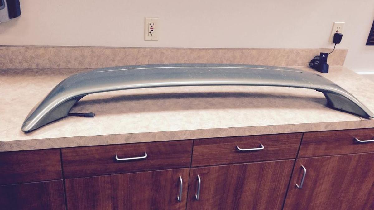 The car that came with this spoiler smashed through several fences early Wednesday, and Eagle police are looking for the driver.