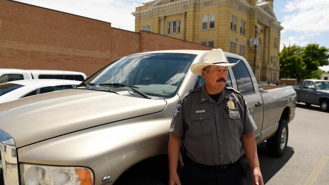Twin Falls County Sheriff Lt. Daron Brown, seen May 24 in Twin Falls, shows a 2005 Dodge Ram 4X4 SLT that has been refitted for law enforcement use after it was seized in a drug bust.