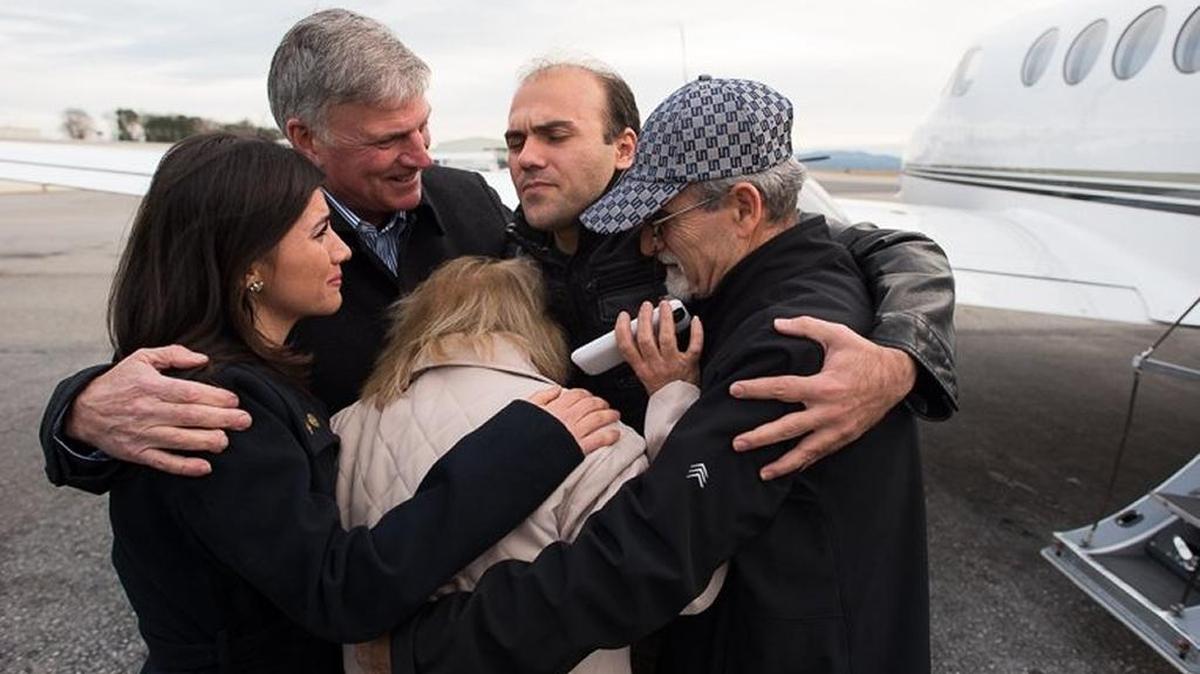 Saeed Abedini, second from right, greets his parents and sister and the Rev. Franklin Graham after arriving in the United States on Jan. 21, 2016.